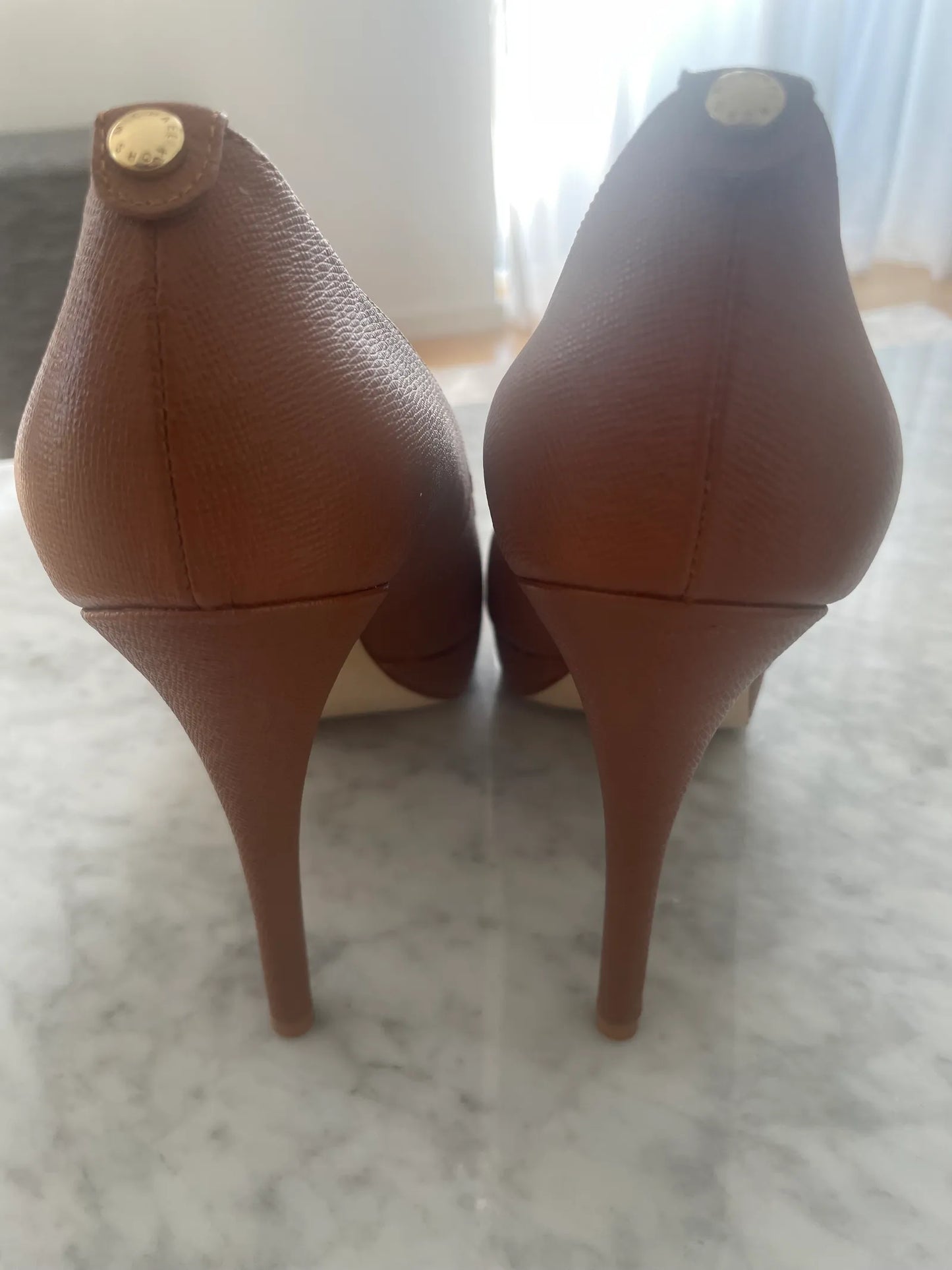 Michael Kors-skinnklackar