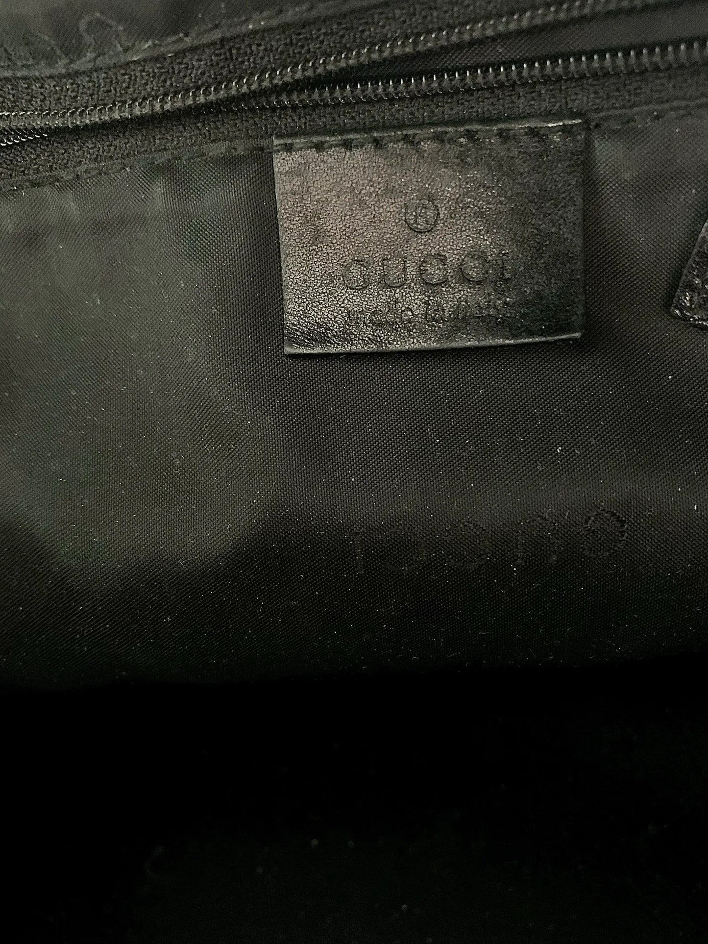 Gucci-skinnhandväska