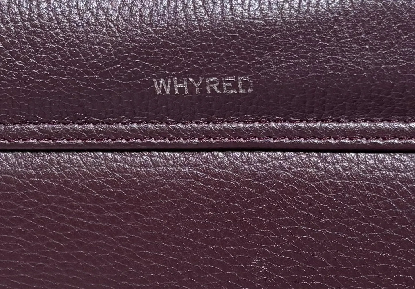 Whyred-skinnaxelremsväska
