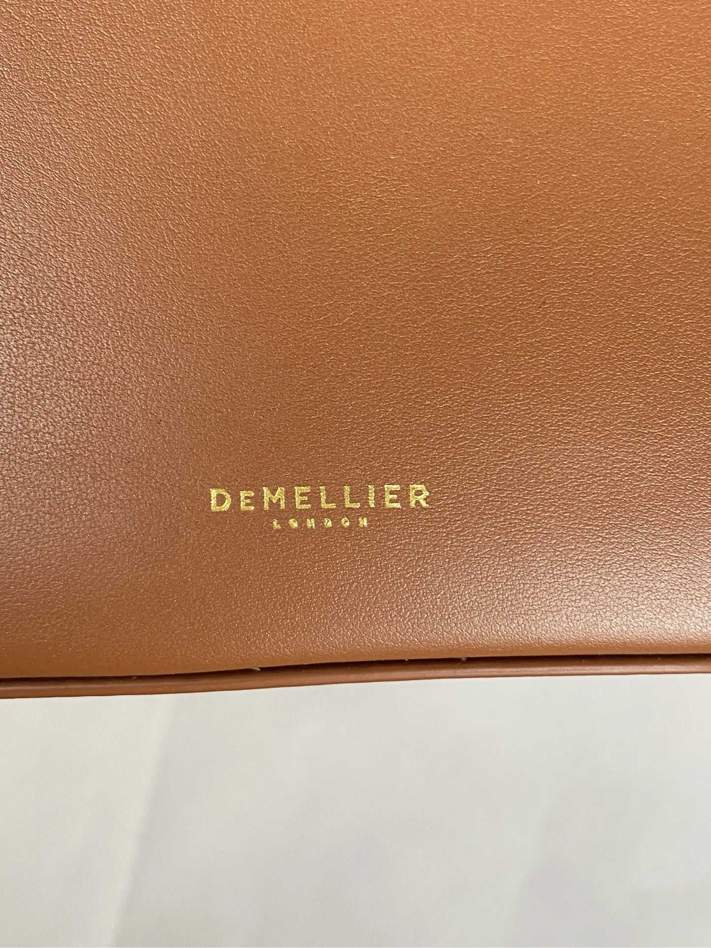 Demellier-skinnhandväska NWOT