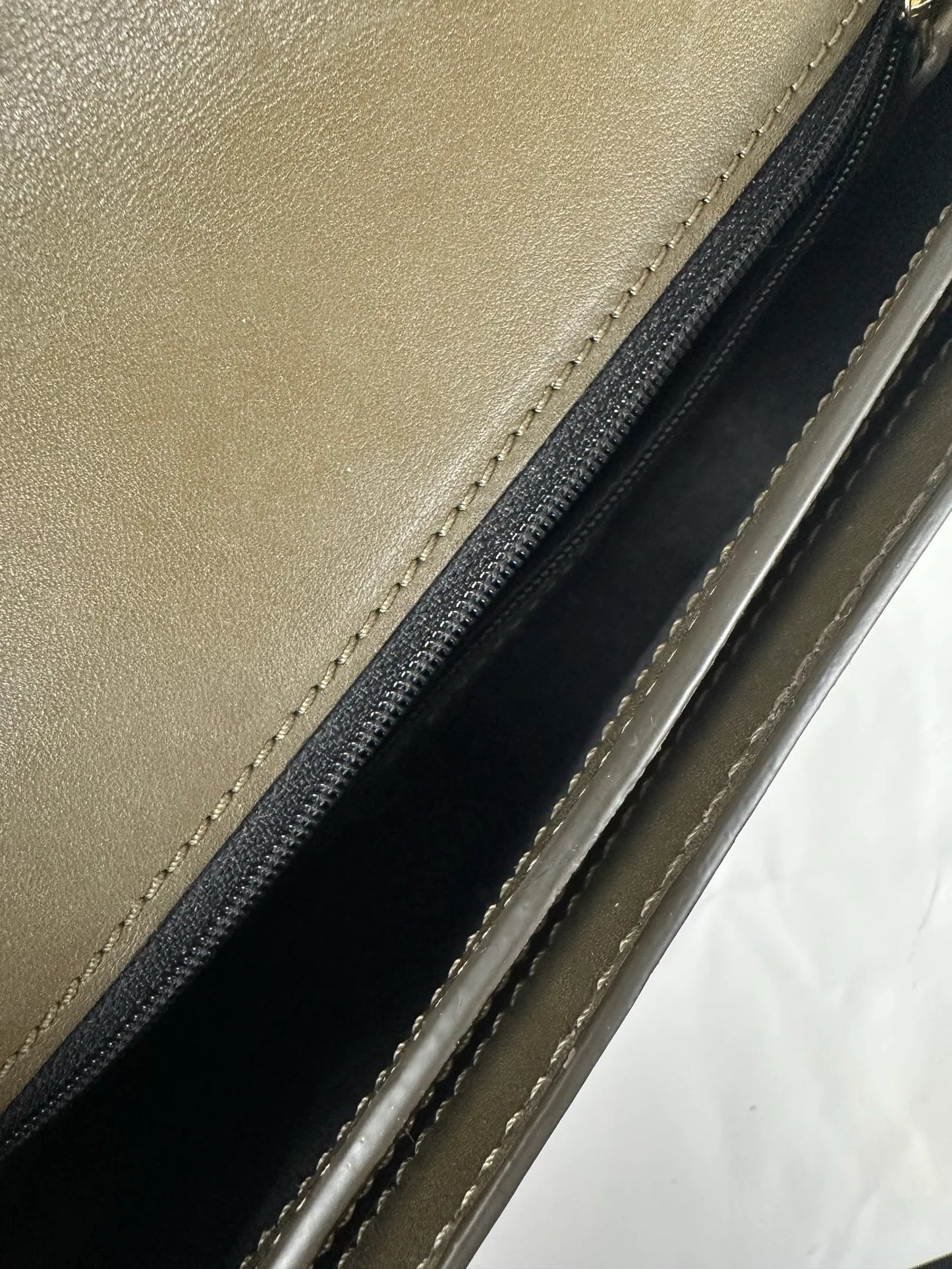 Demellier Vancouver-skinnaxelremsväska