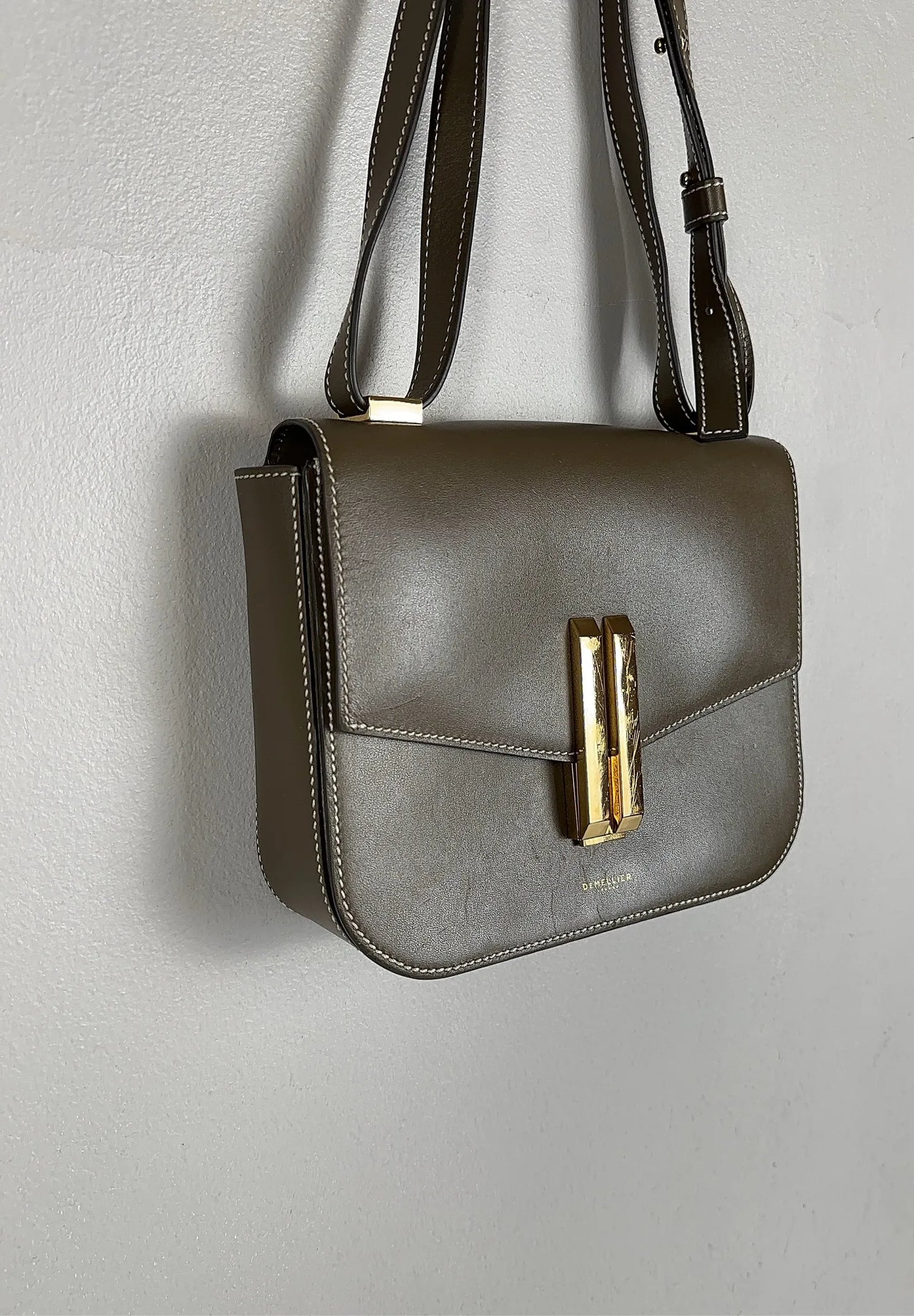 Demellier Vancouver-skinnaxelremsväska