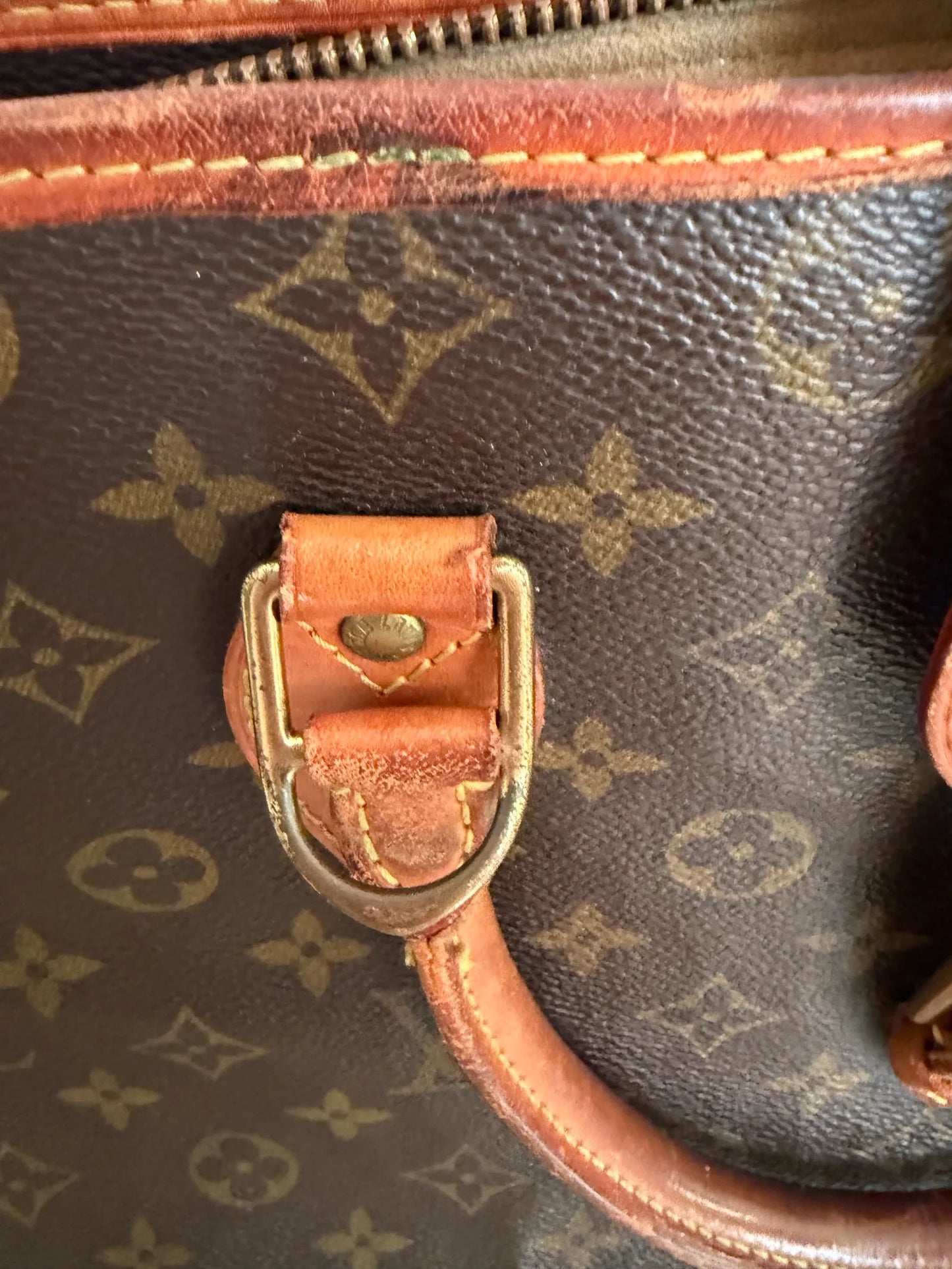 Louis Vuitton Rivoli-skinndatorväska