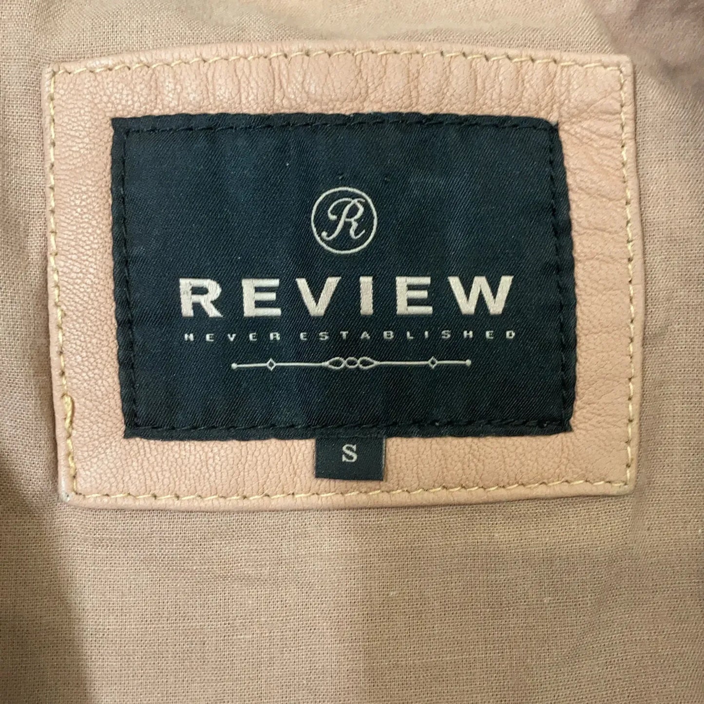 Review-skinnjacka