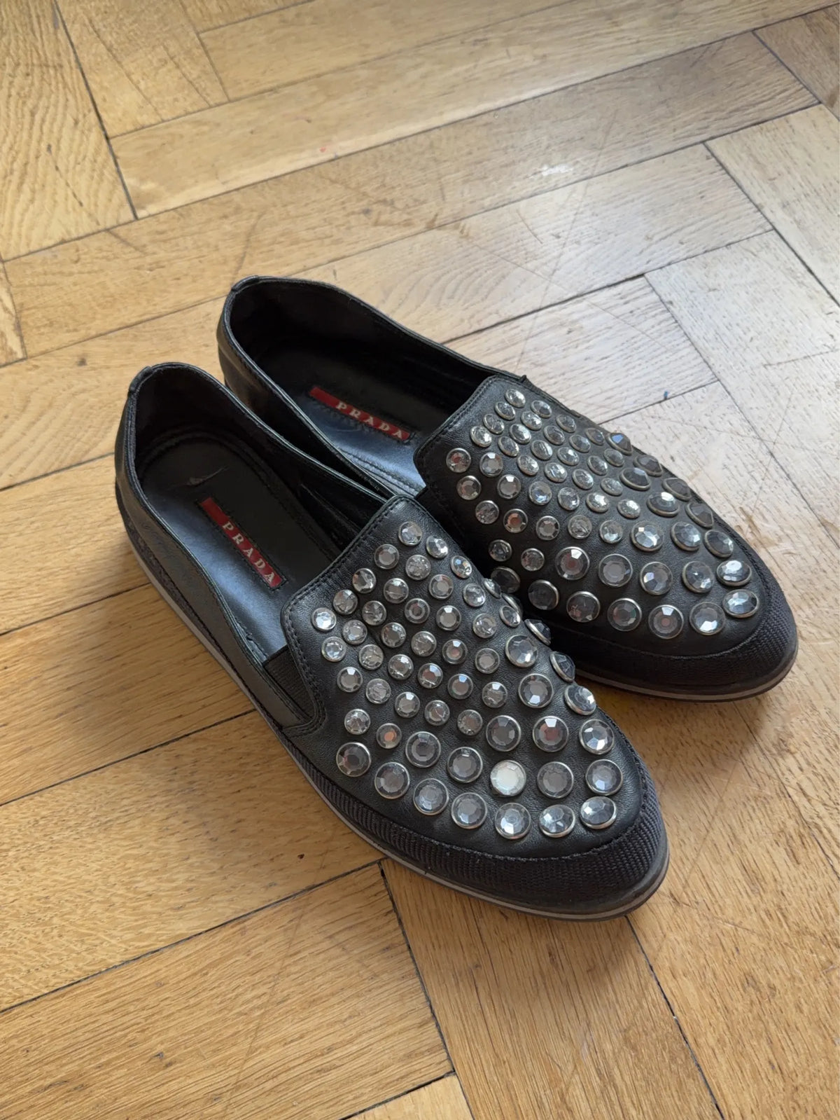 Prada-skinnloafers