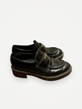 Prada-skinnloafers