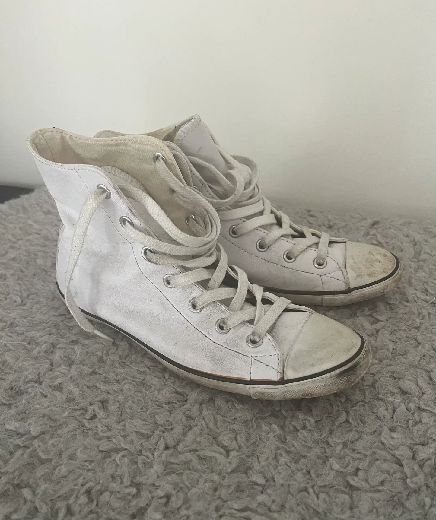 Converse-skinnsneakers