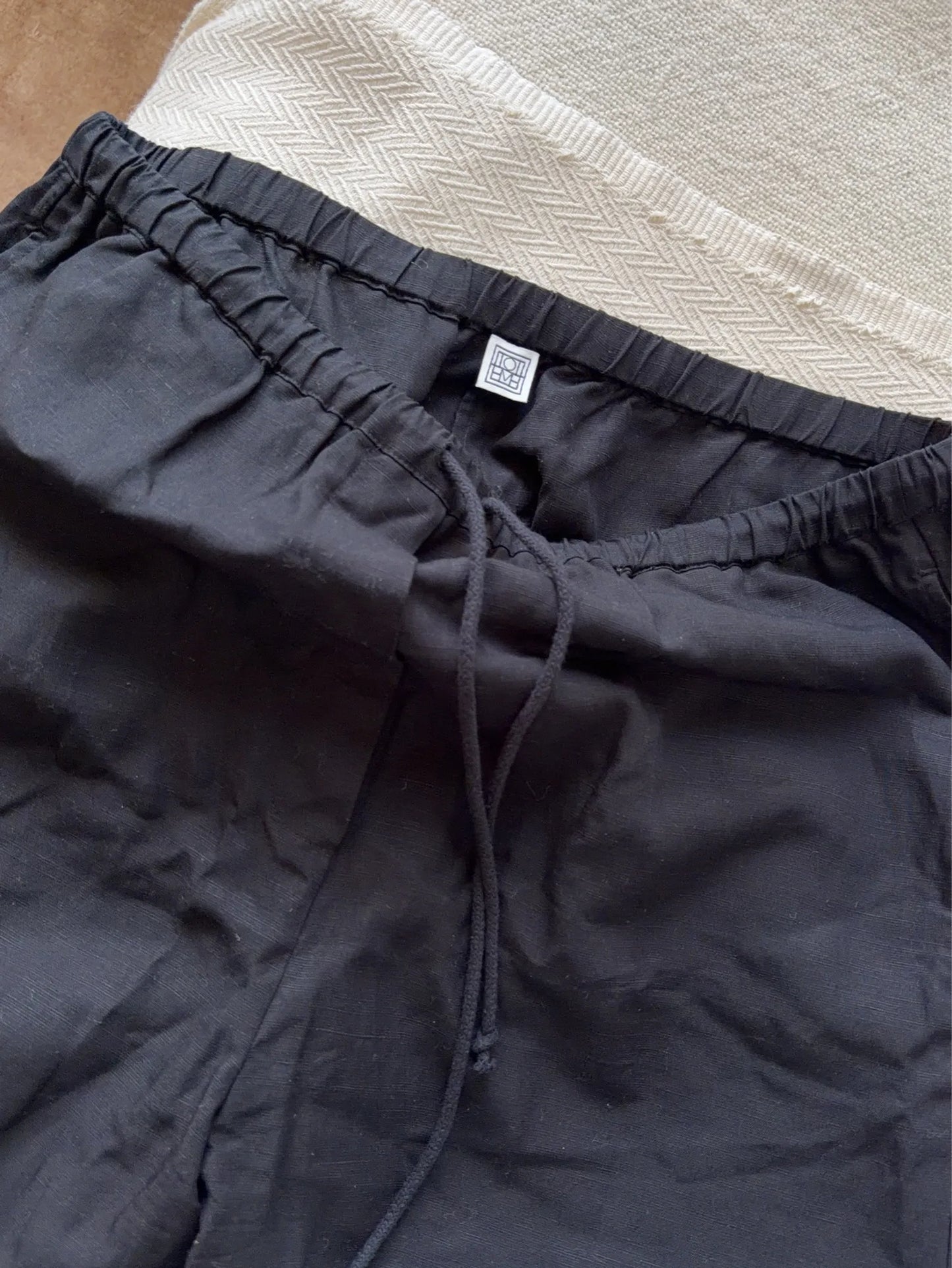 Toteme Press-creased Drawstring Trousers