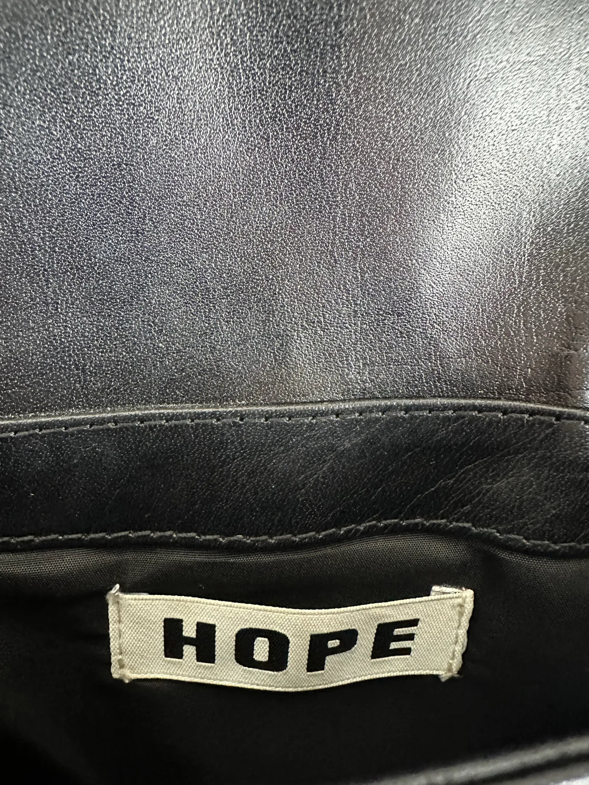 Hope-skinnaxelremsväska