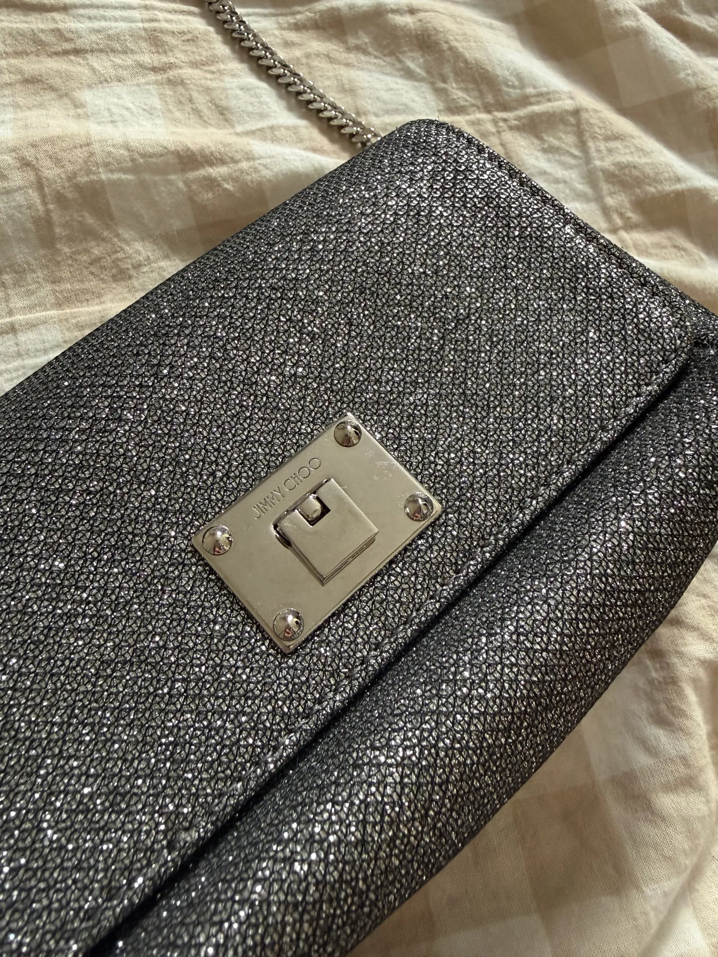 Jimmy Choo-axelremsväska