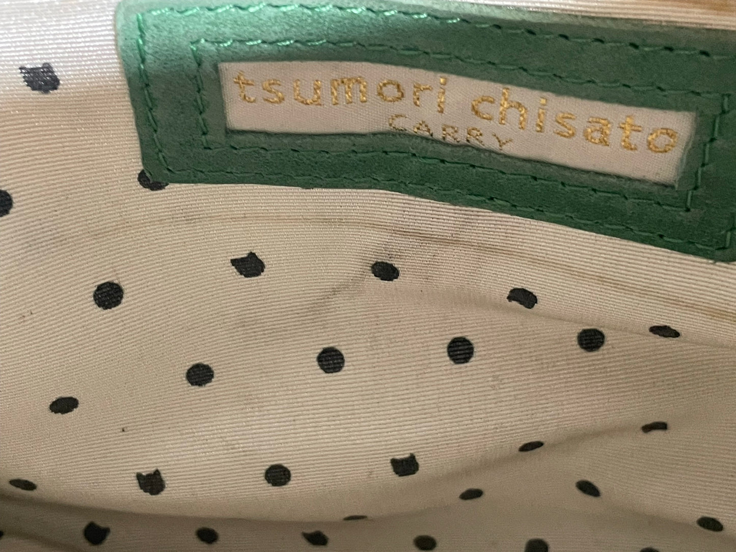 Tsumori Chisato-skinnaxelremsväska