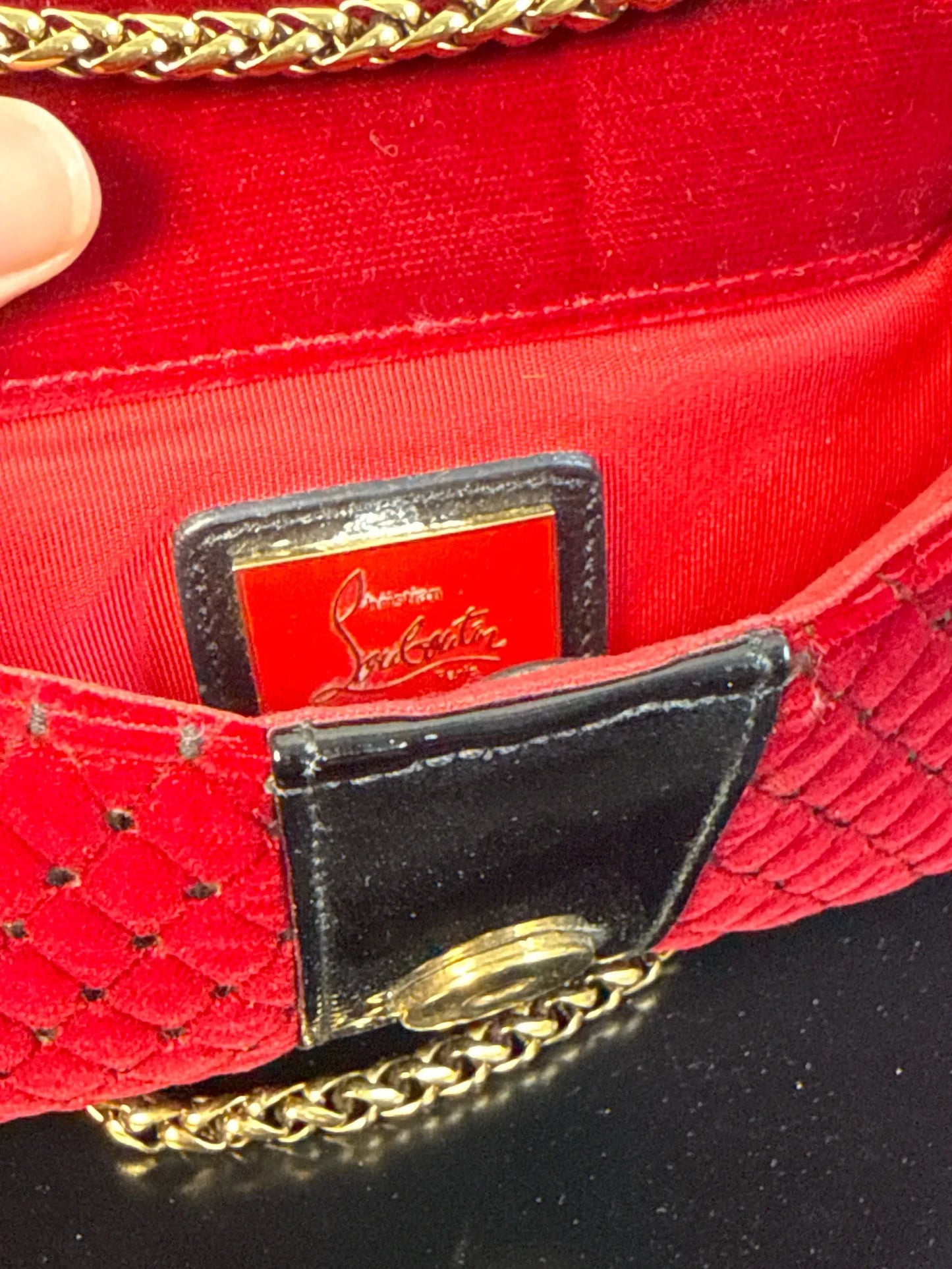 Christian Louboutin-axelremsväska