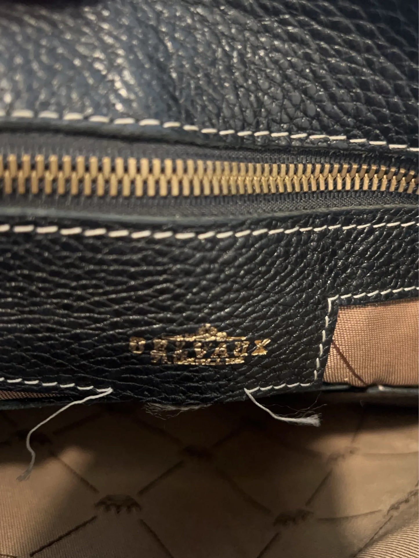 Delvaux-skinnaxelremsväska