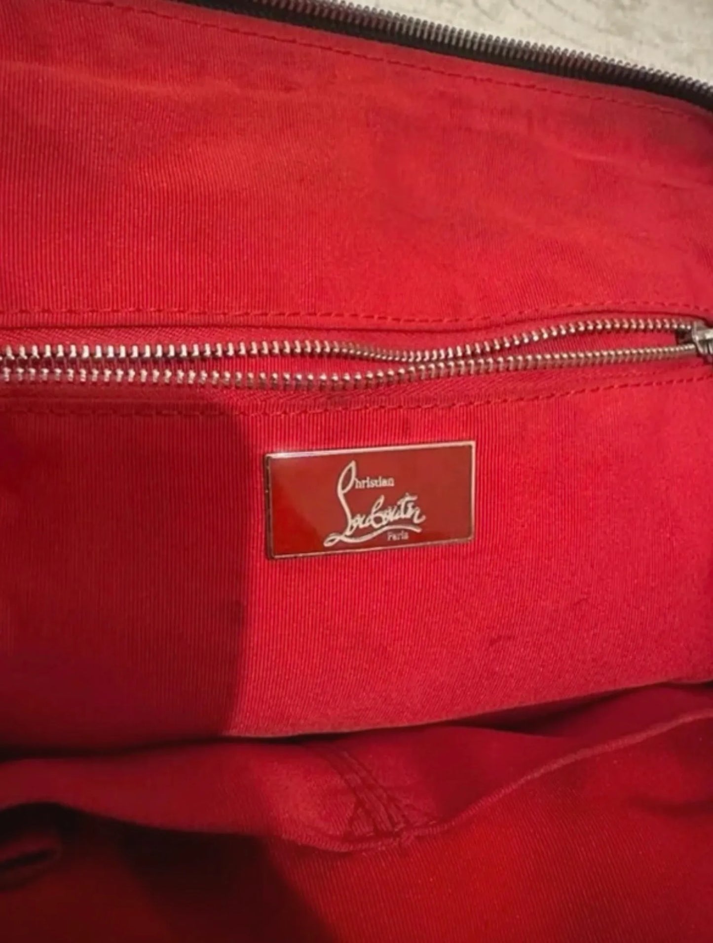 Christian Louboutin-skinnhandväska