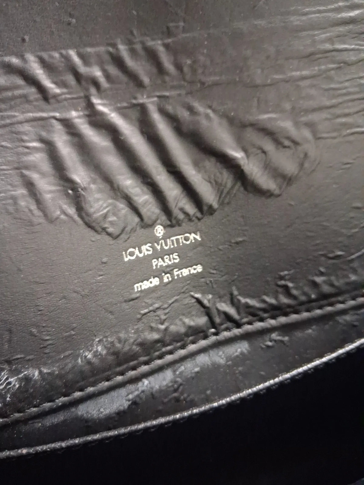 Louis Vuitton-skinndatorväska