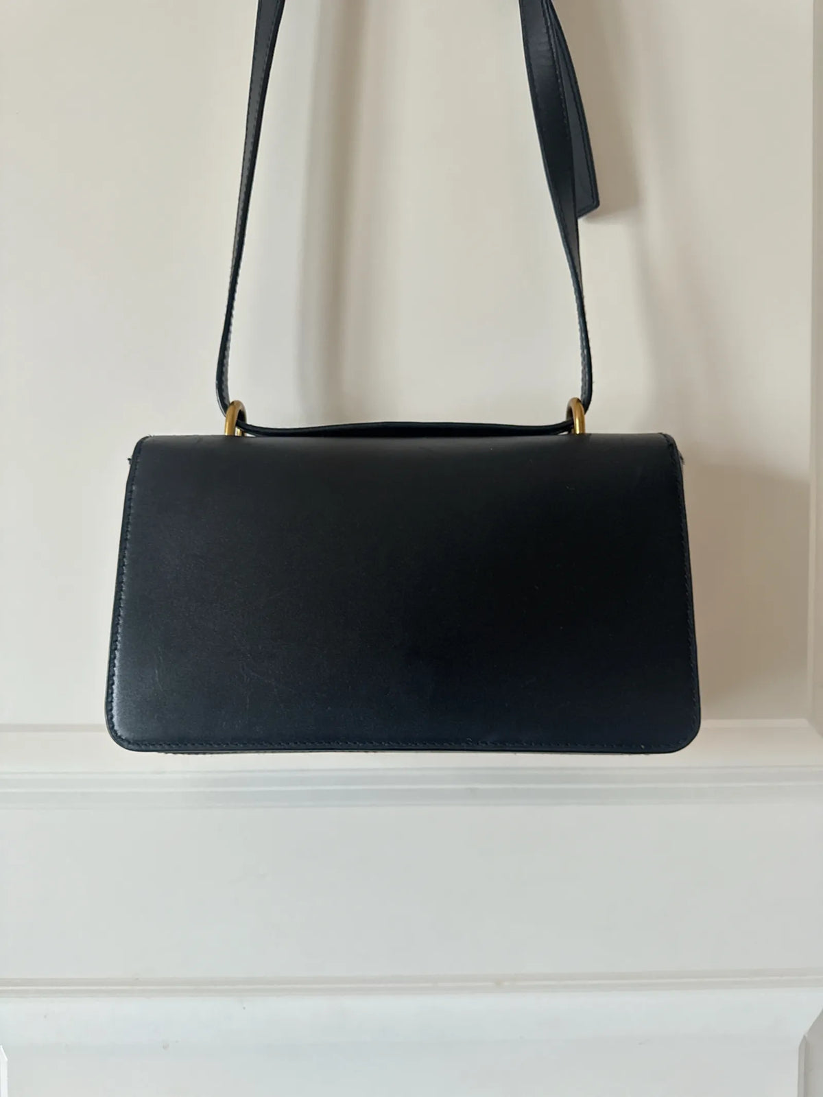 By Malene Birger Noval-skinnaxelremsväska