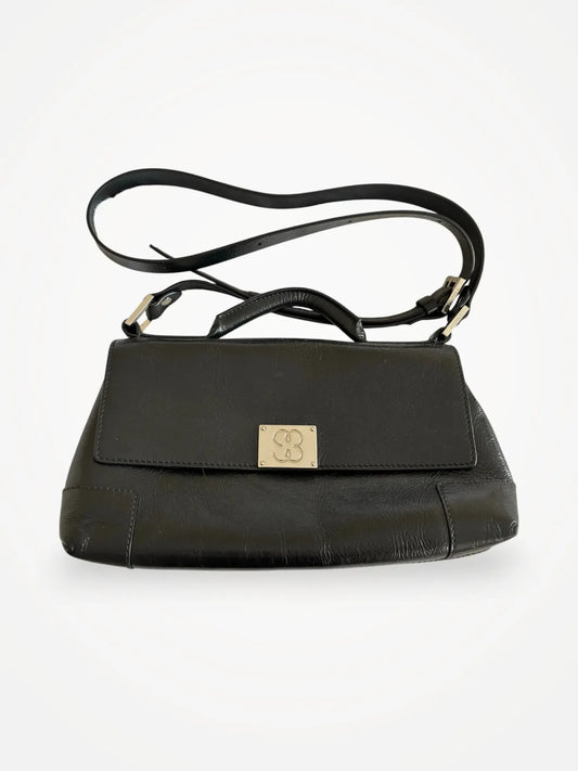 Filippa K 93 Monogram-skinnaxelremsväska