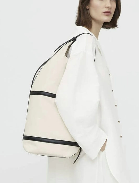 Toteme Leather-trimmed Canvas Sling-skinnaxelremsväska NWOT