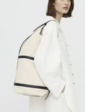 Toteme Leather-trimmed Canvas Sling-skinnaxelremsväska NWOT