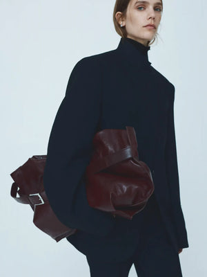 H&M Studio-skinnaxelremsväska