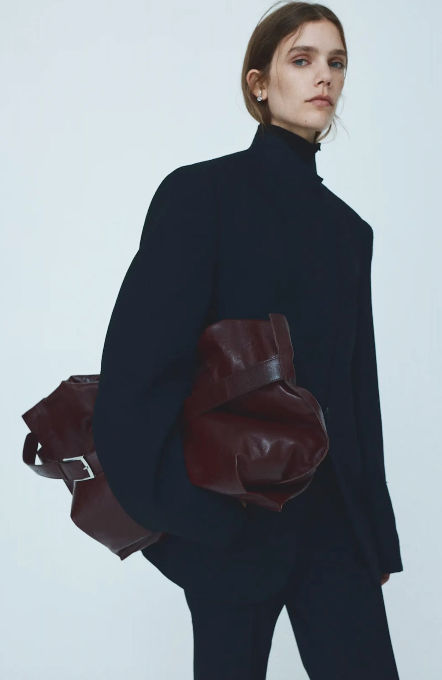 H&M Studio-skinnaxelremsväska