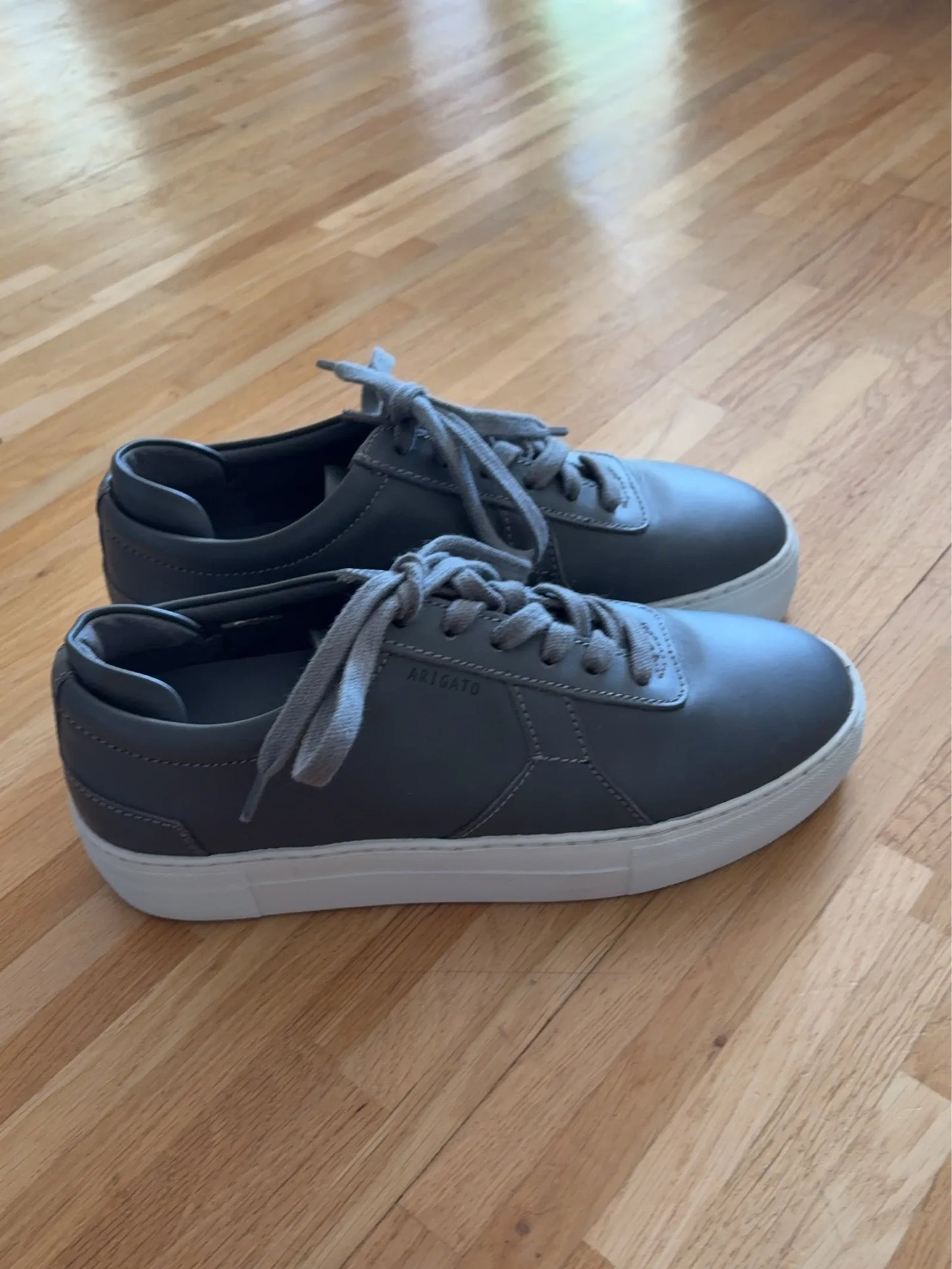 Axel Arigato-skinnsneakers NWOT