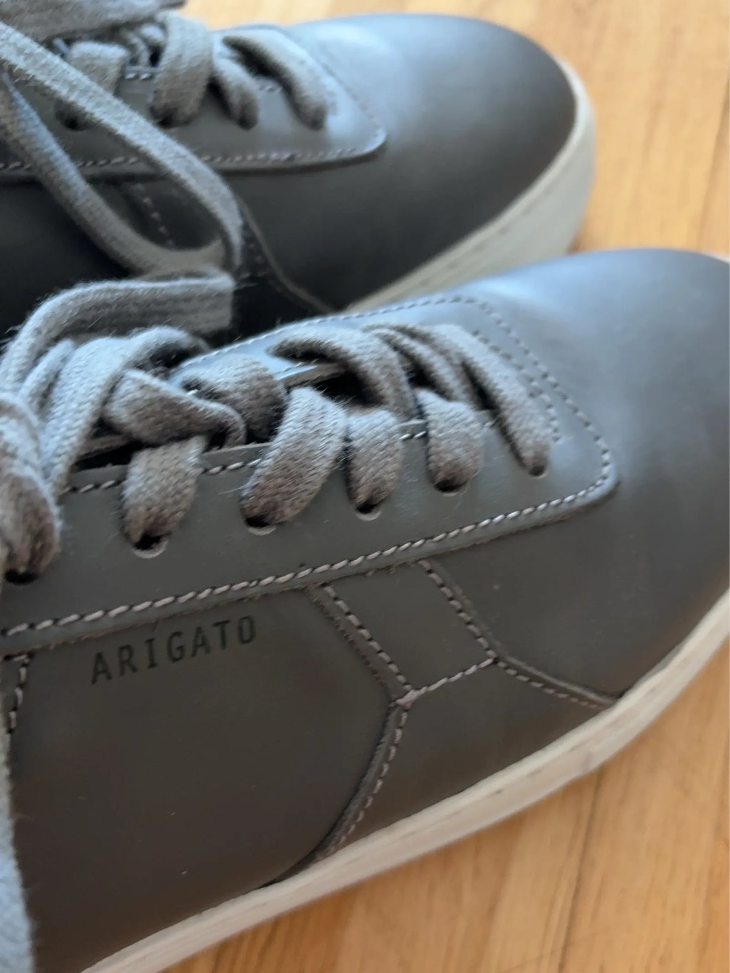 Axel Arigato-skinnsneakers NWOT