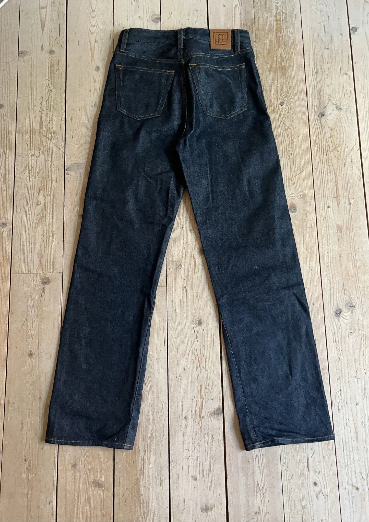 Toteme Twisted Seam Full Length Raw Blue Jeans