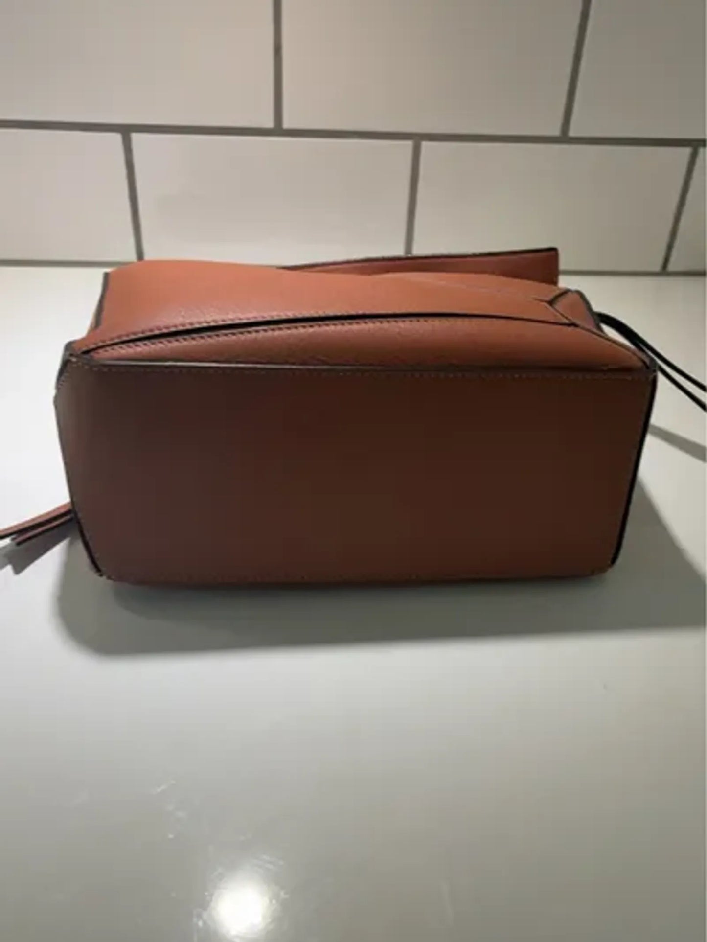 Loewe Puzzle-skinnaxelremsväska