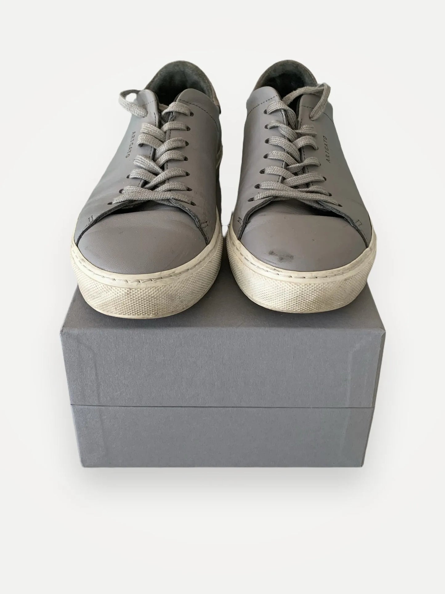 Axel Arigato-skinnsneakers
