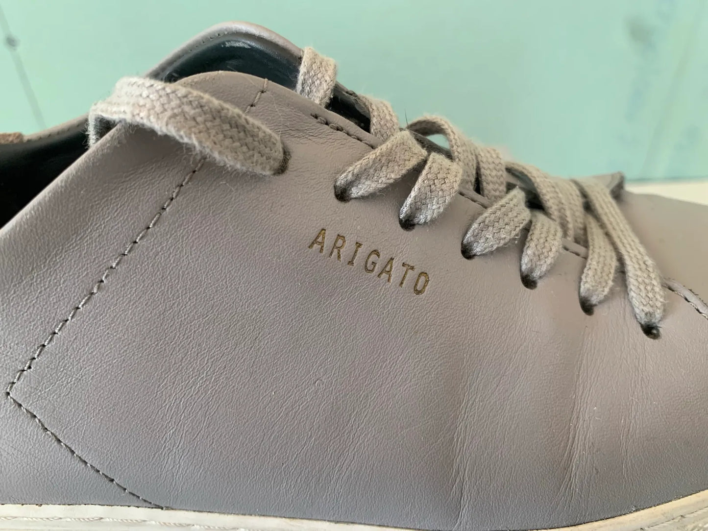 Axel Arigato-skinnsneakers