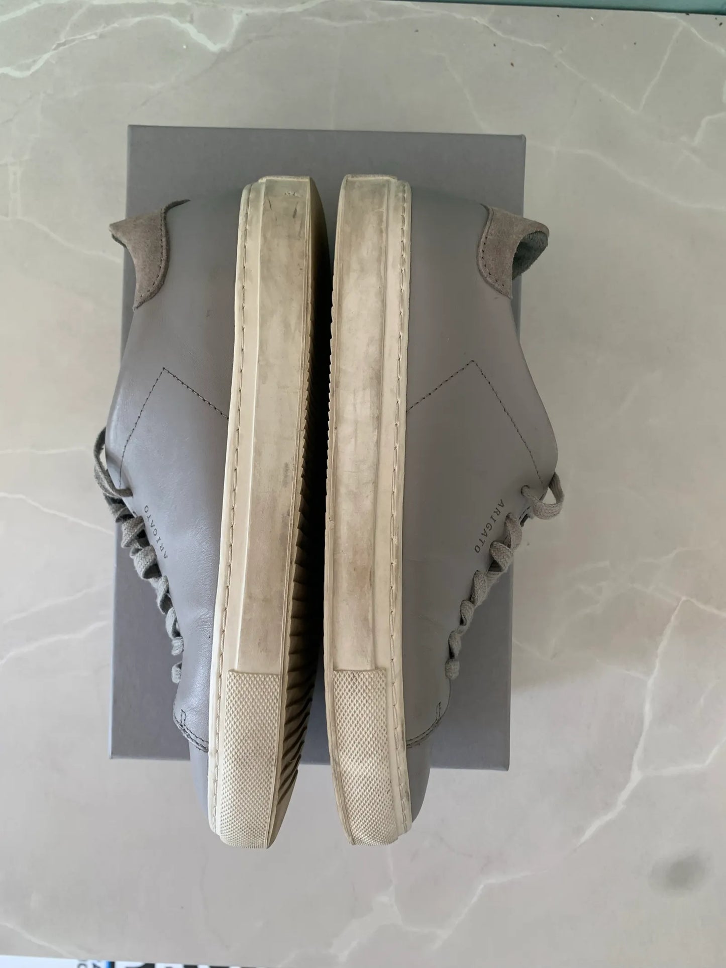 Axel Arigato-skinnsneakers