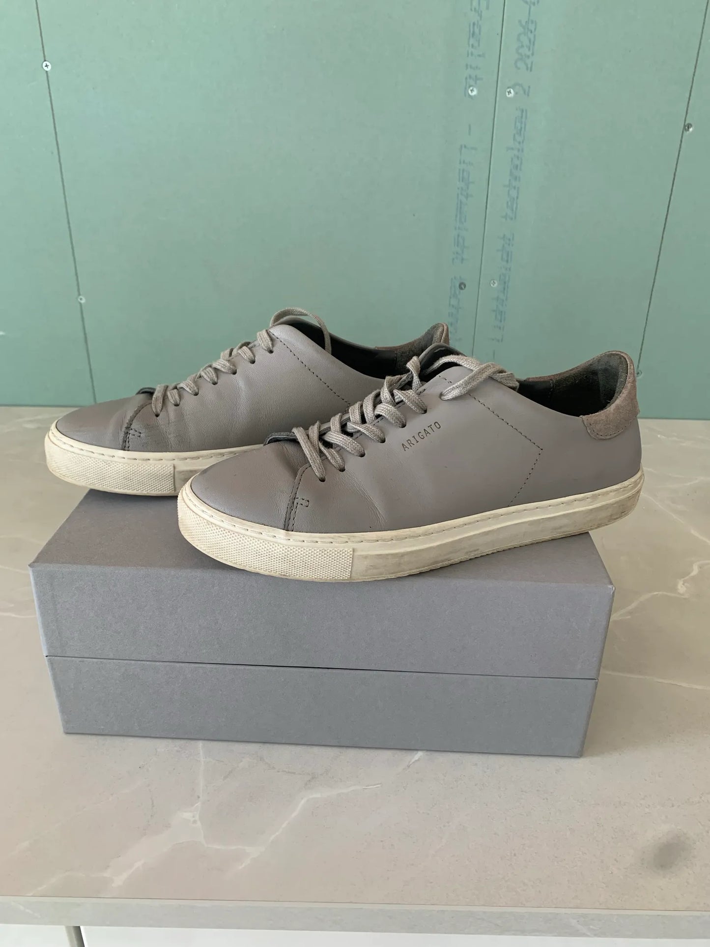 Axel Arigato-skinnsneakers