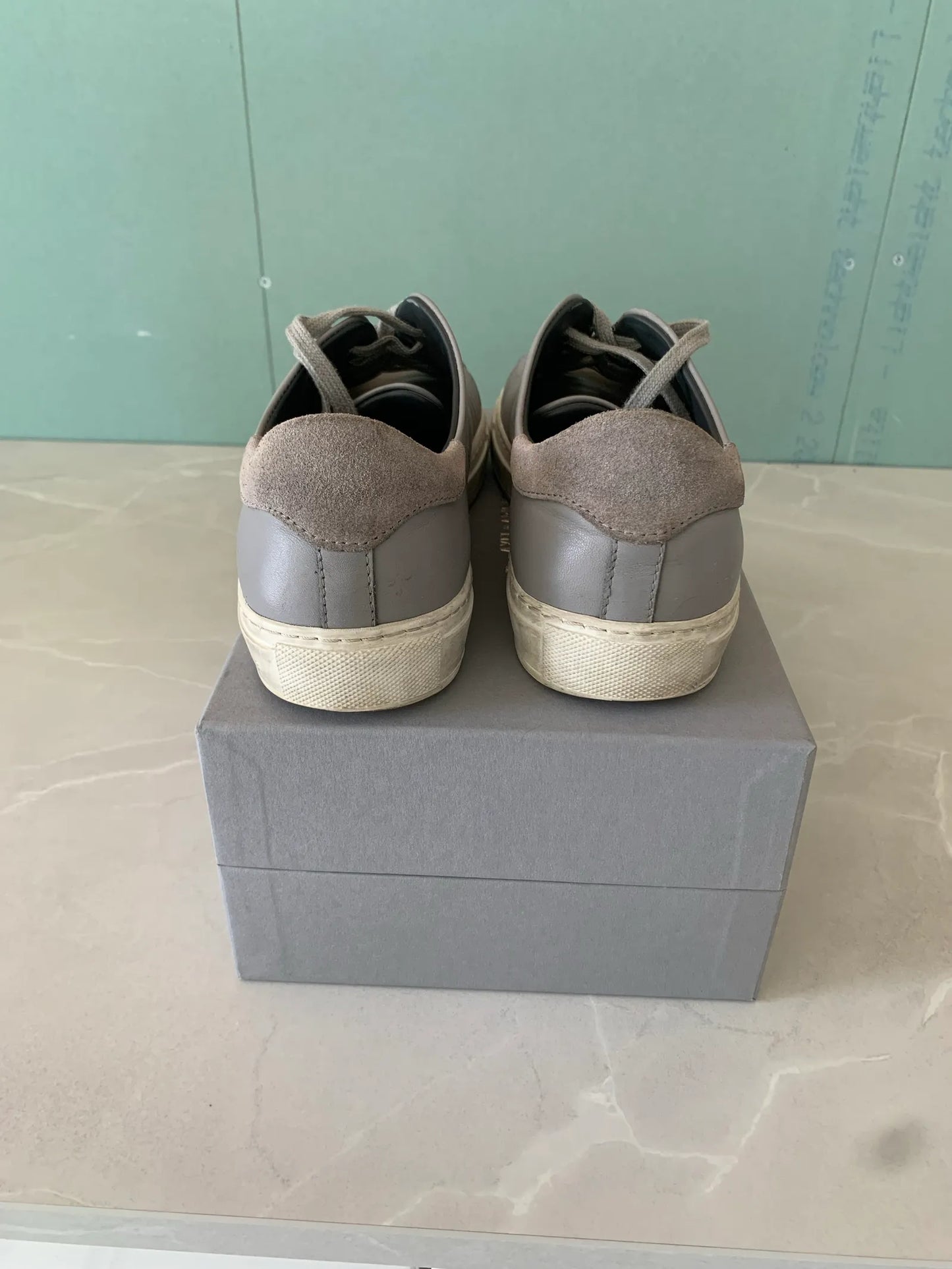 Axel Arigato-skinnsneakers