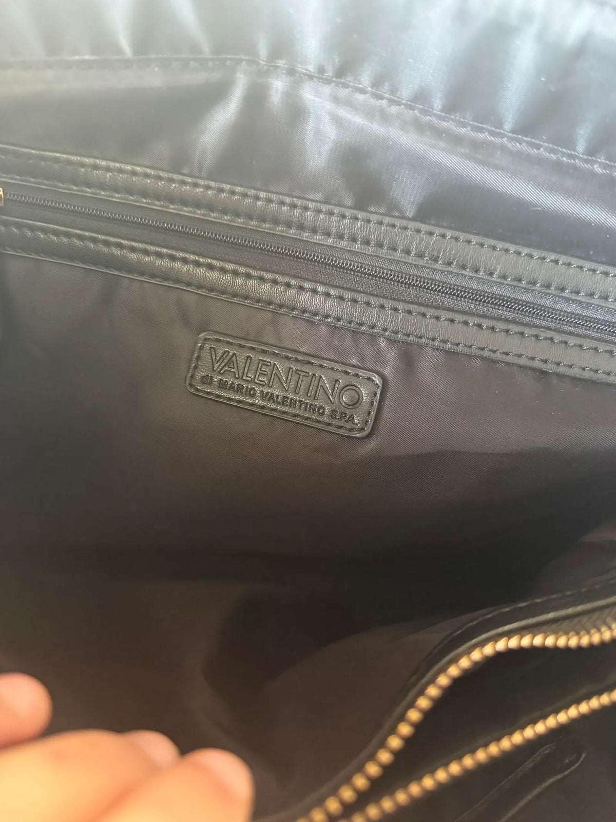 Valentino-skinnhandväska
