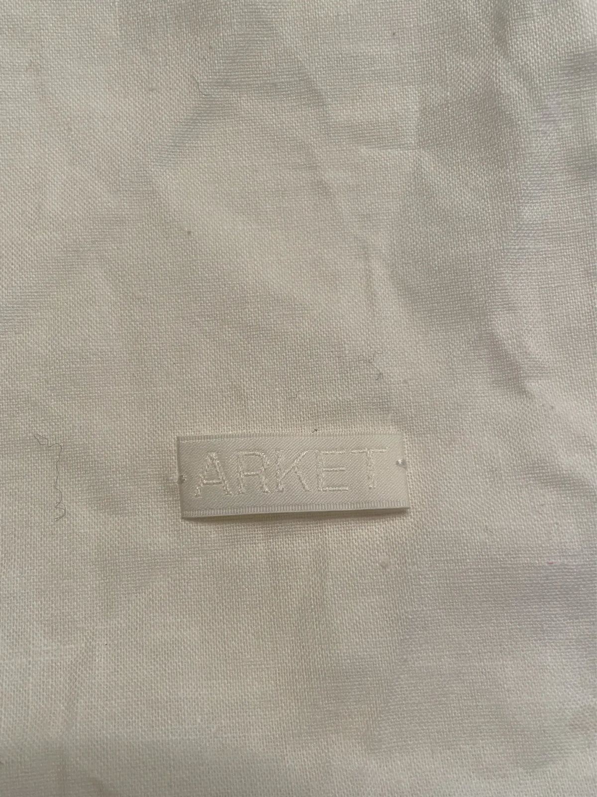 Arket-skinnaxelremsväska